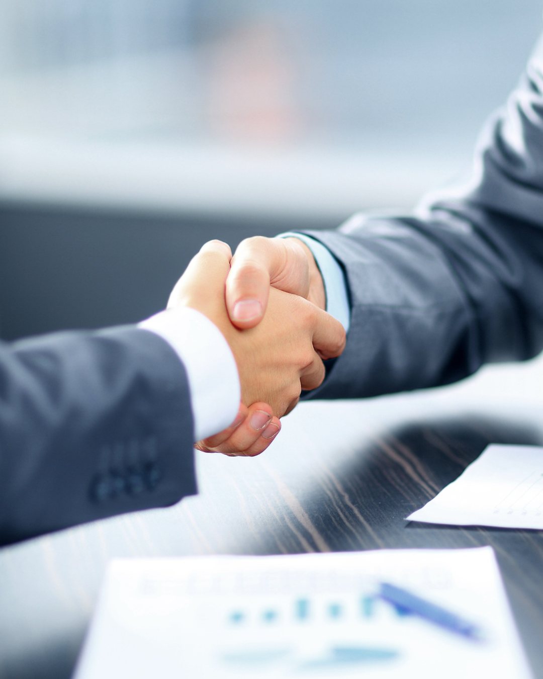 Business partners shaking hands