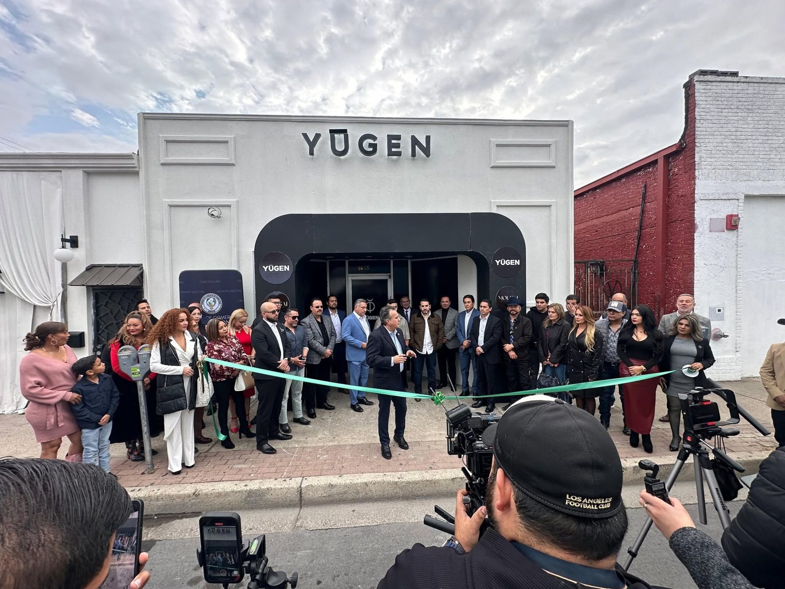 CAMCOIN ribbon cutting for a member business